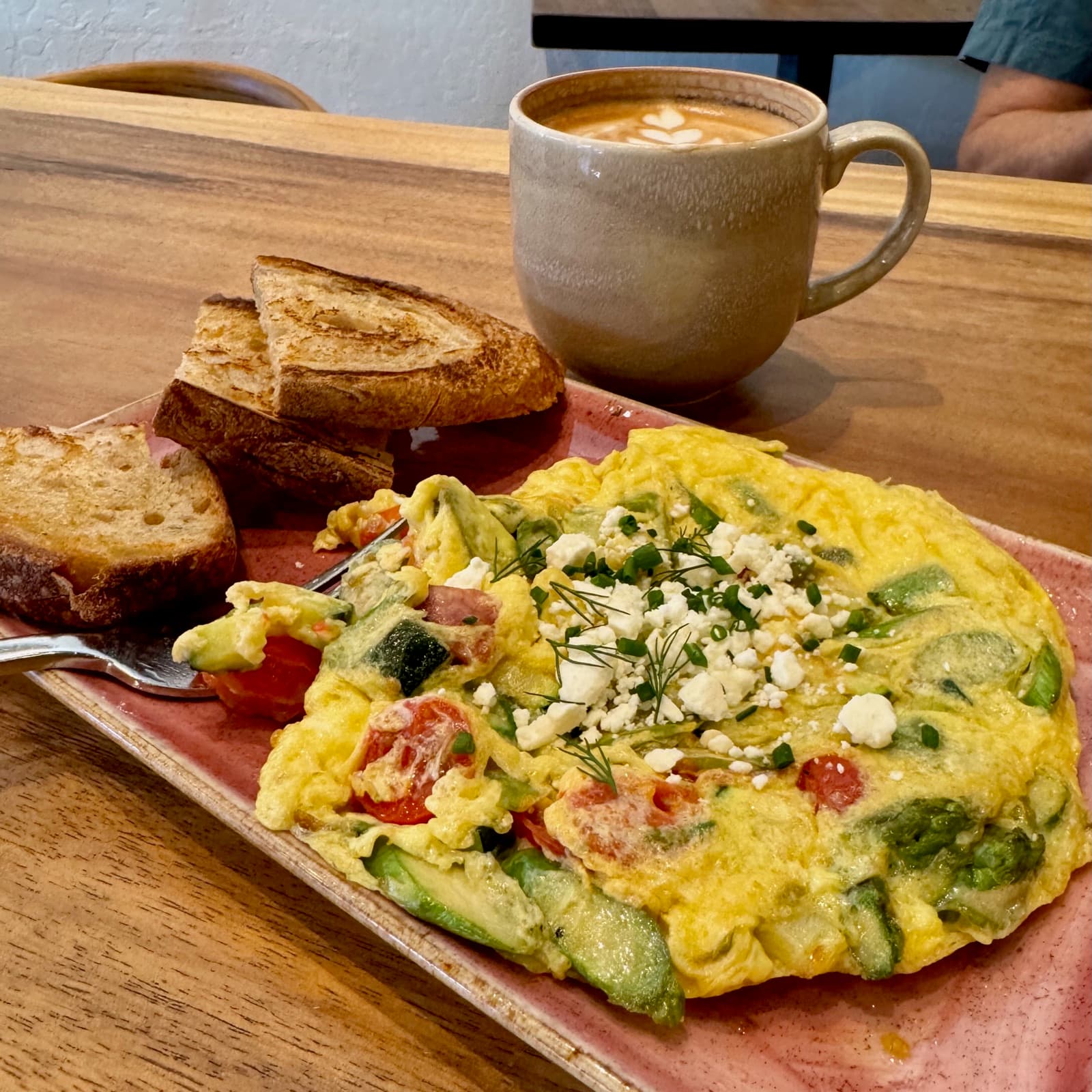 Mediterranean egg scrambler with toast